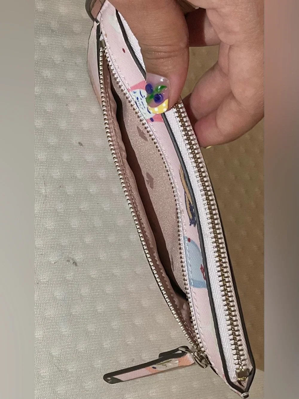 kate spade Pink Champagne Bottle Print Wristlet